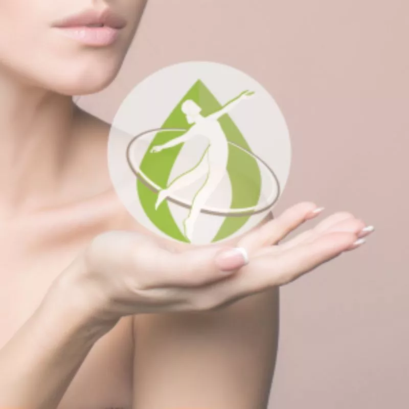 Lady with bare shoulder holding Harmony Massage Therapies logo in her hand